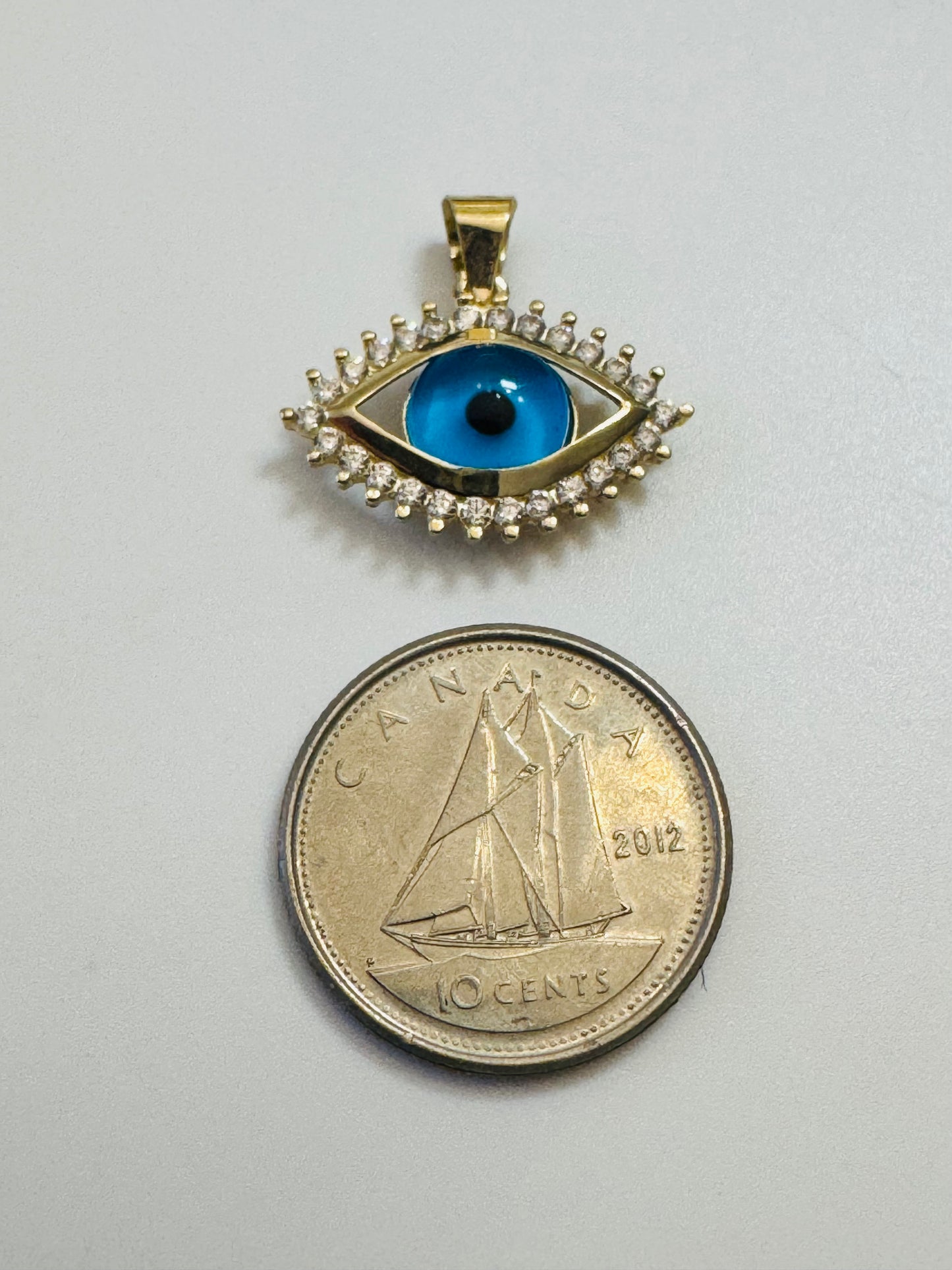 #428 Pendentif 3ème œil bleu avec zircon blanc en or 10k