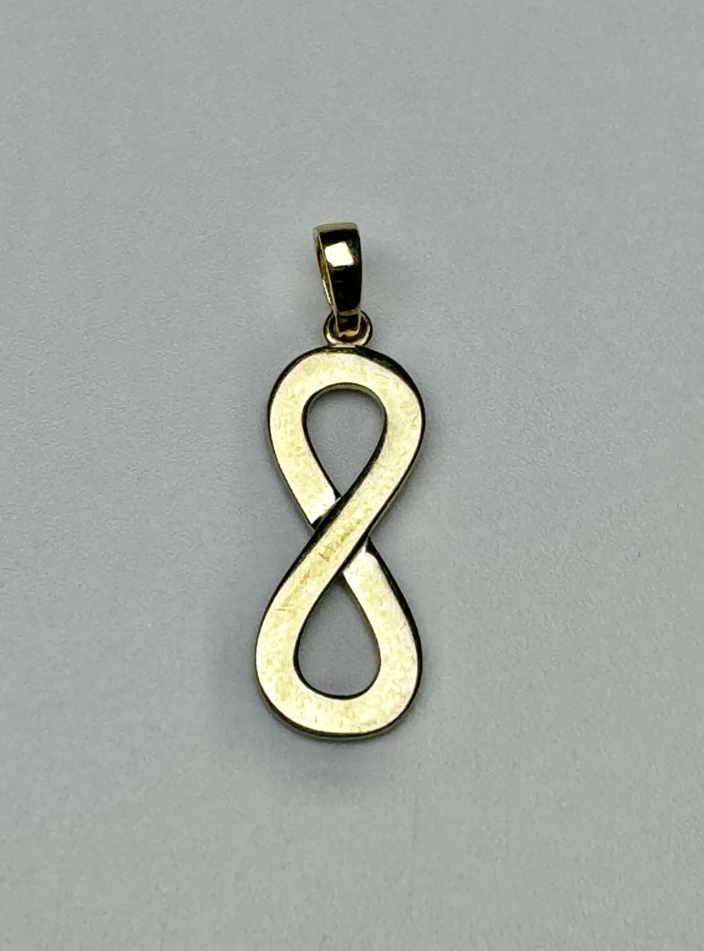 Pendentif infini uni en or