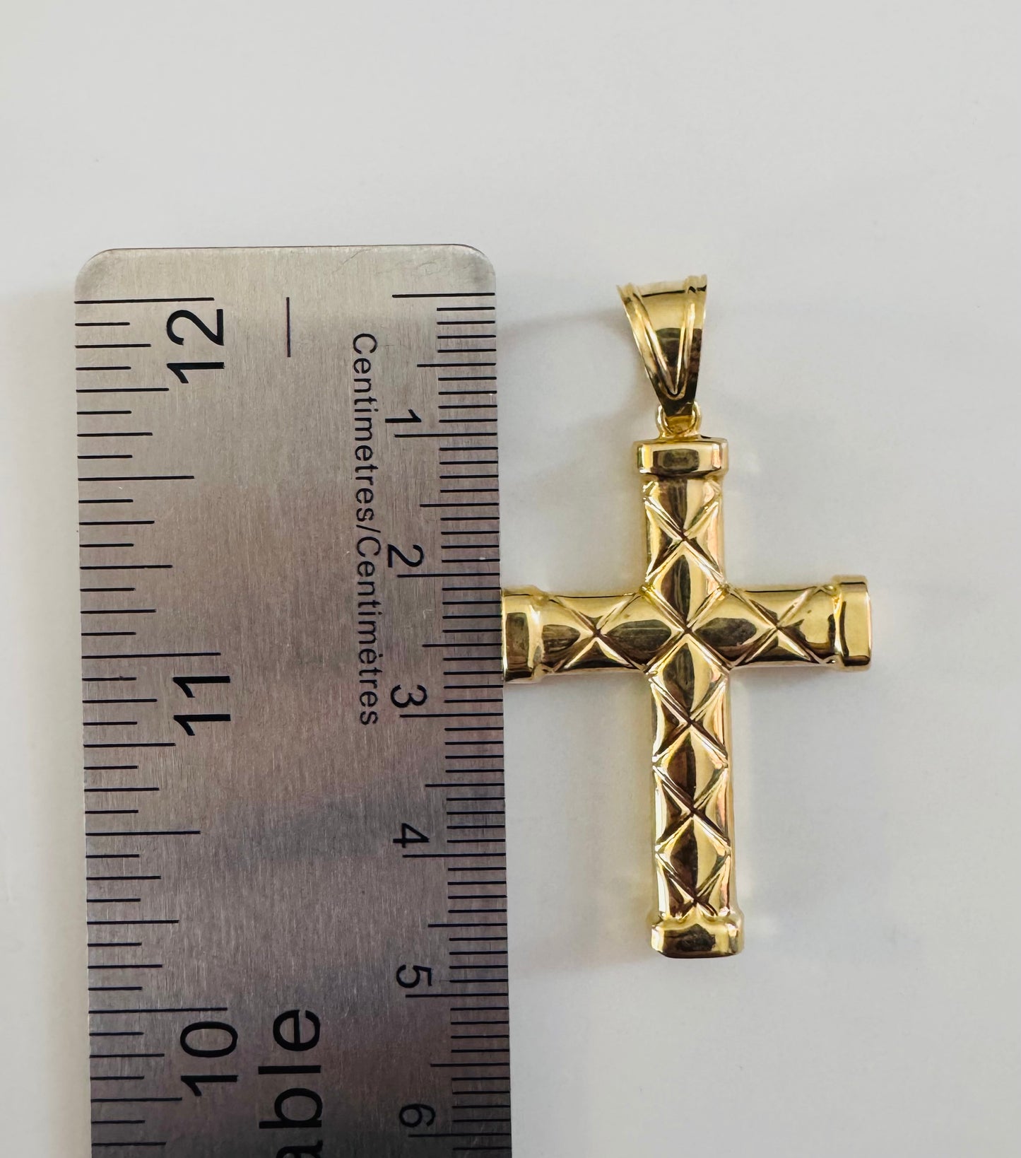 #438 pendentif croix avec ligne en x 5mm en or 10k