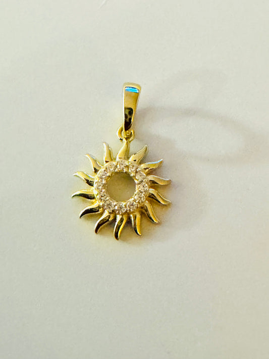 #403 pendentif petit soleil avec zircon en or 10k