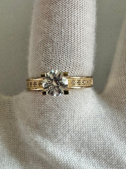 #203 bague alliance solitaire sertie de zircon en or 10k