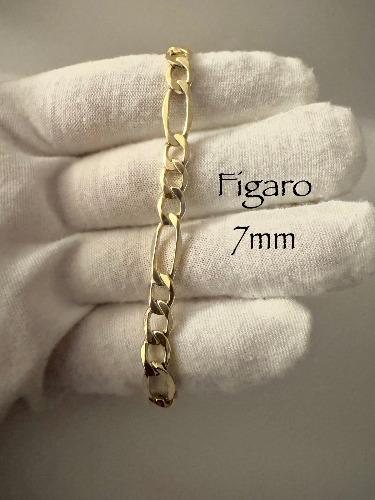 Chaîne figaro 7mm en vrai or 10k