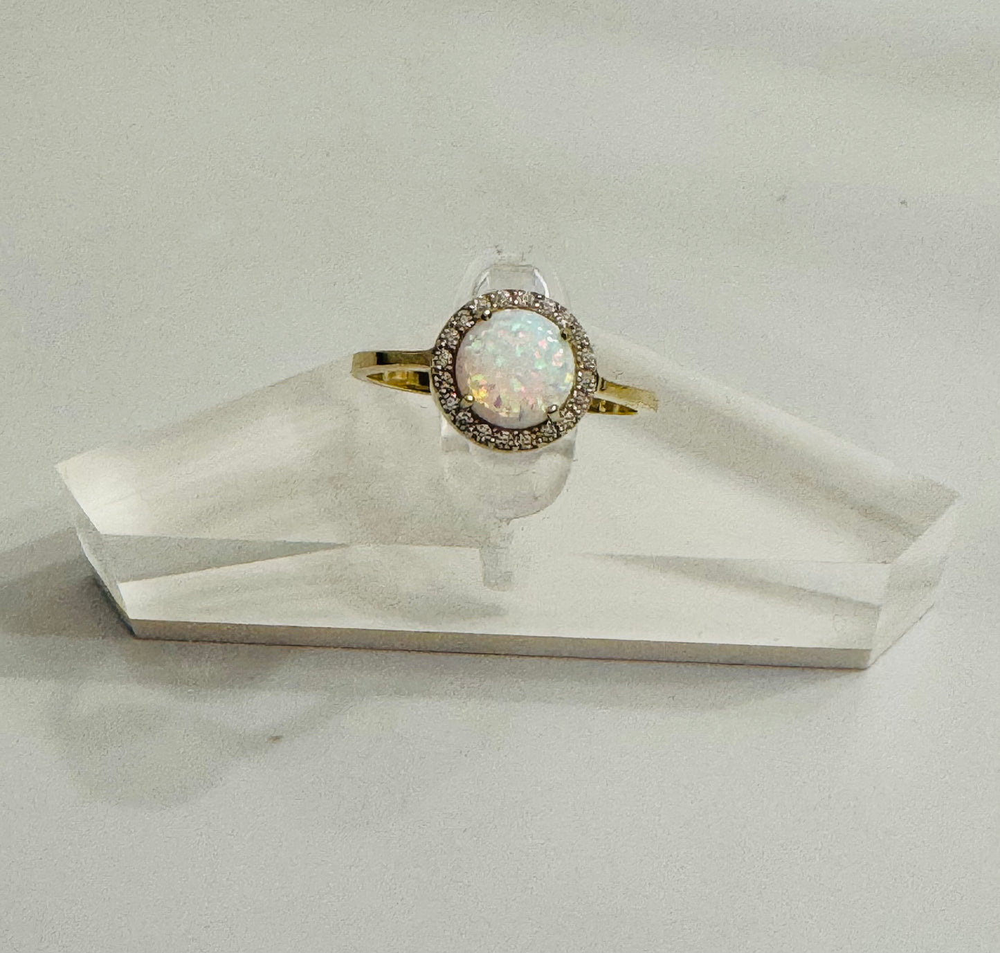 #215 Round ring with brilliant white stone and zircon in 10k gold