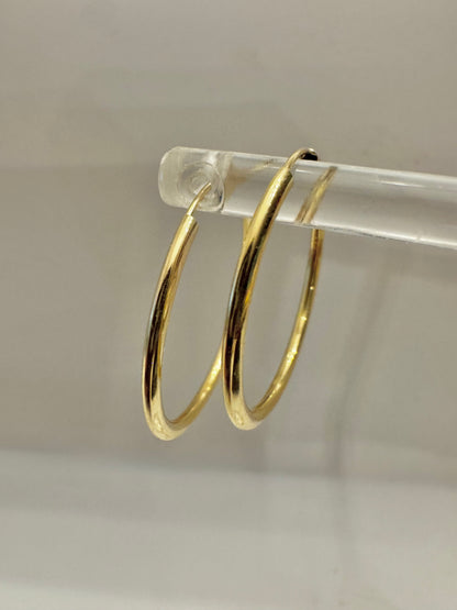 #318 boucles d’oreilles dormeuses unies grandeur 1$ en or 10k