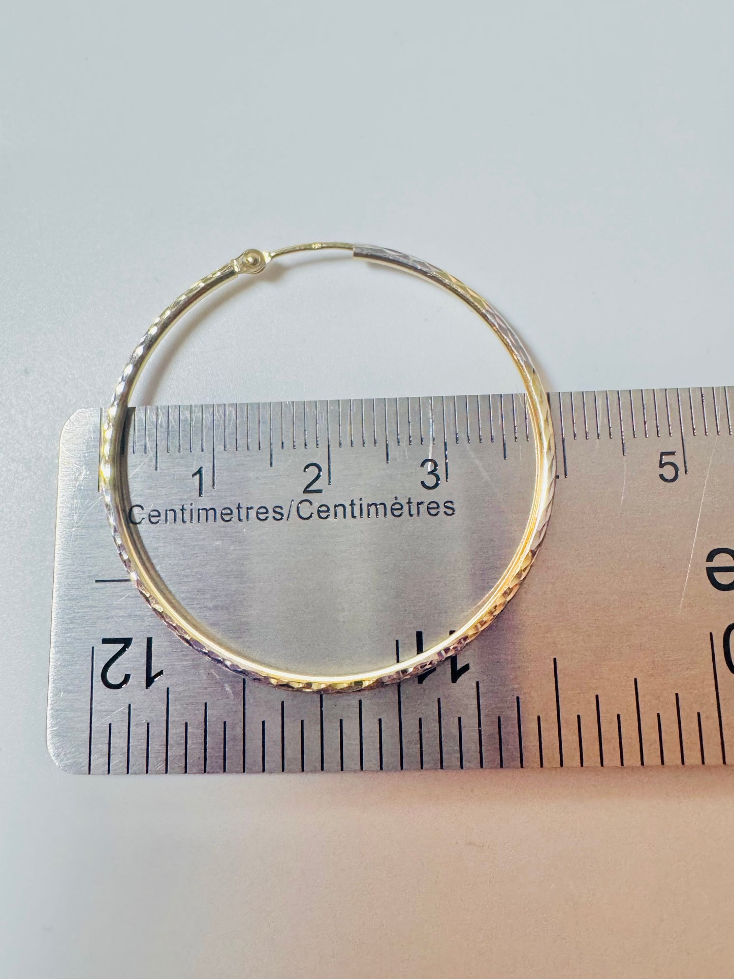 #322 boucles d’oreilles anneaux coupe diamantée 3,5cm en or 10k