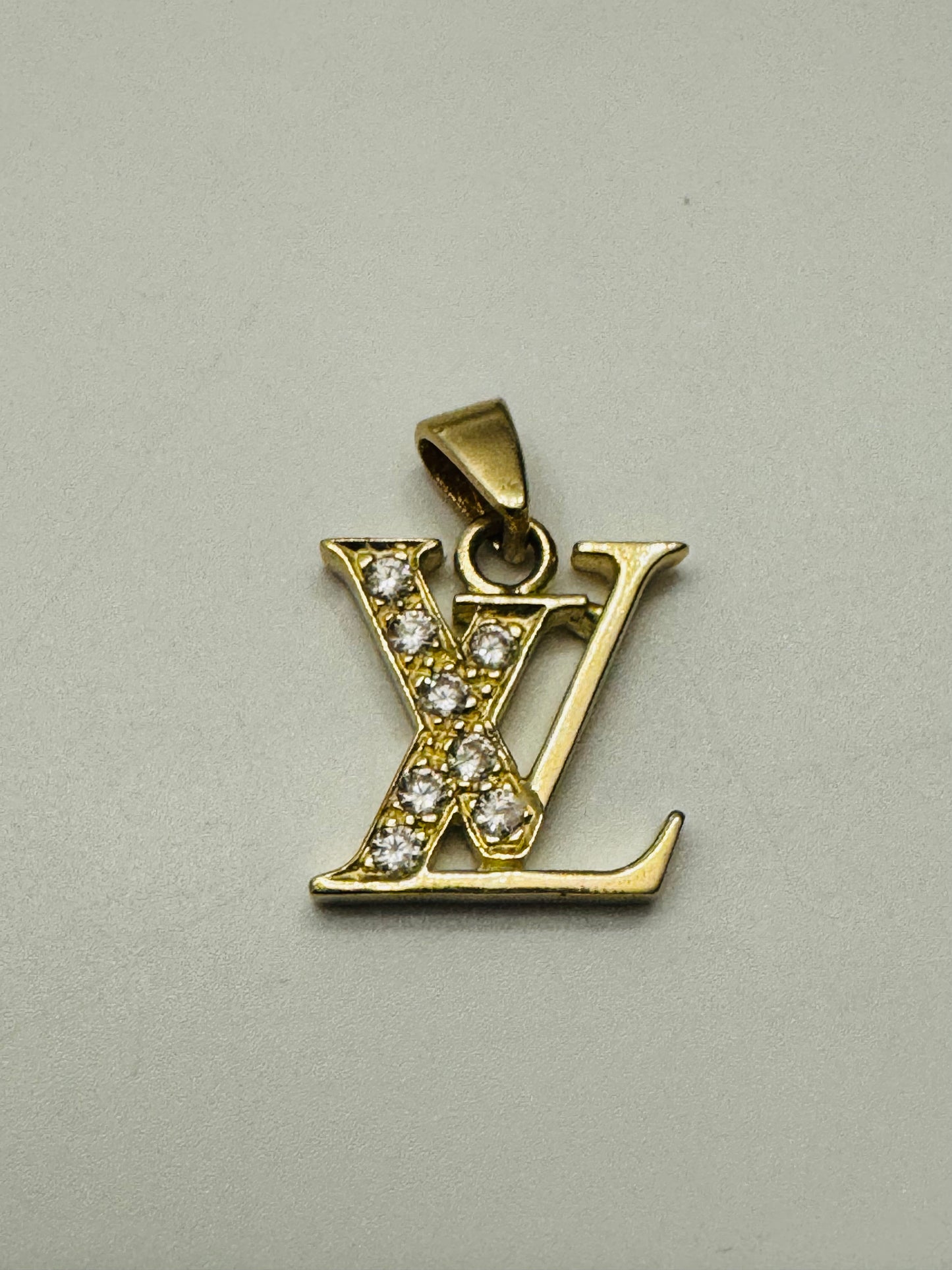 #442 pendentif LV avec zircon en or 10k