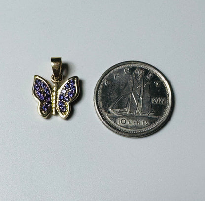 #444 Colgante de mariposa con circonita morada en oro de 10k
