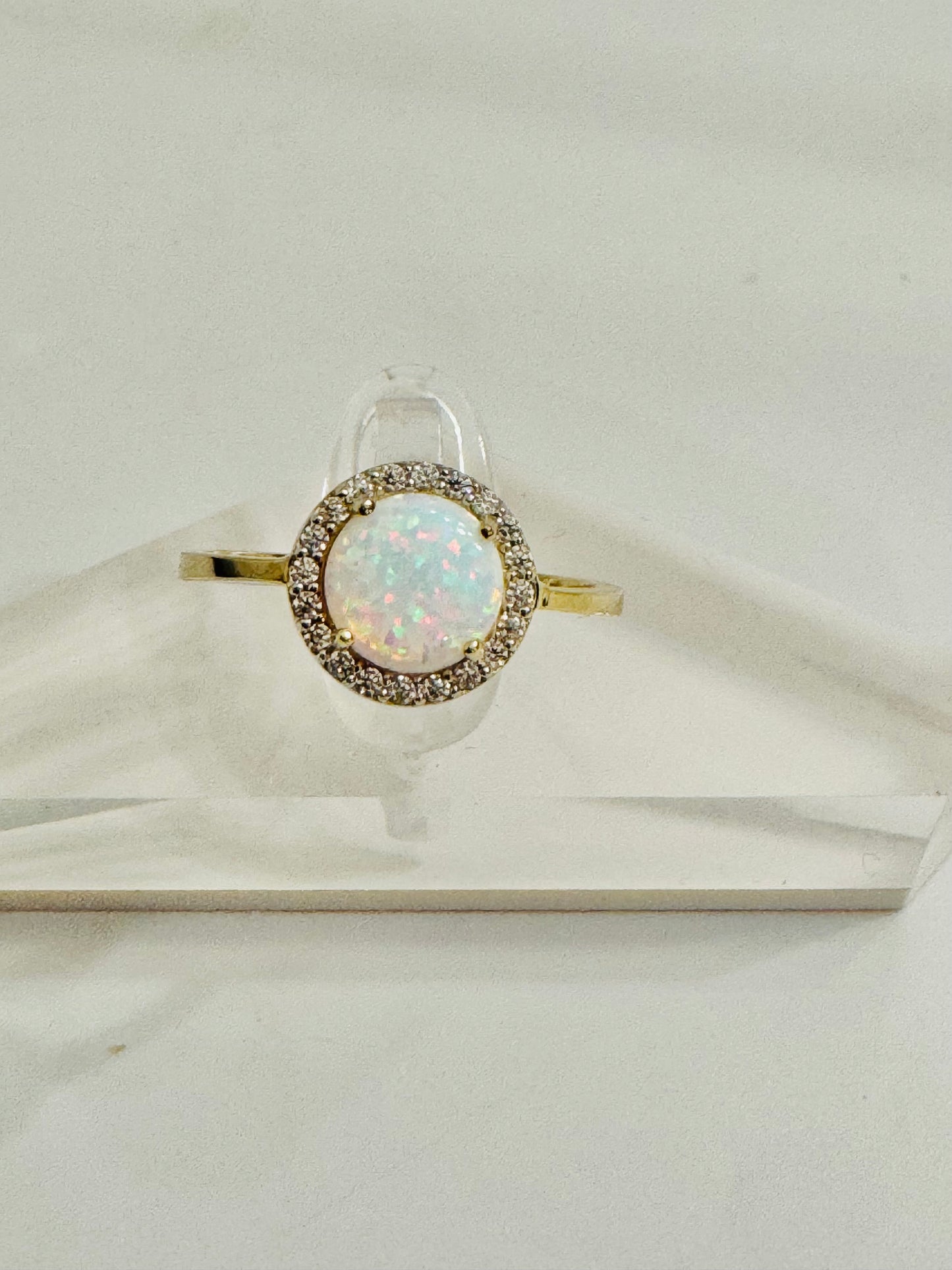 #215 Round ring with brilliant white stone and zircon in 10k gold