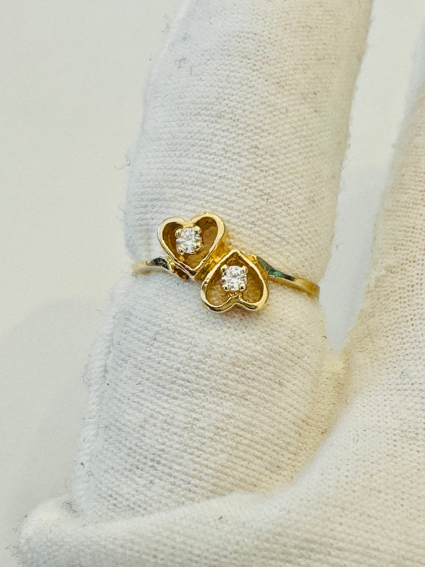 #210 bague double cœur zircon au centre en or 10k