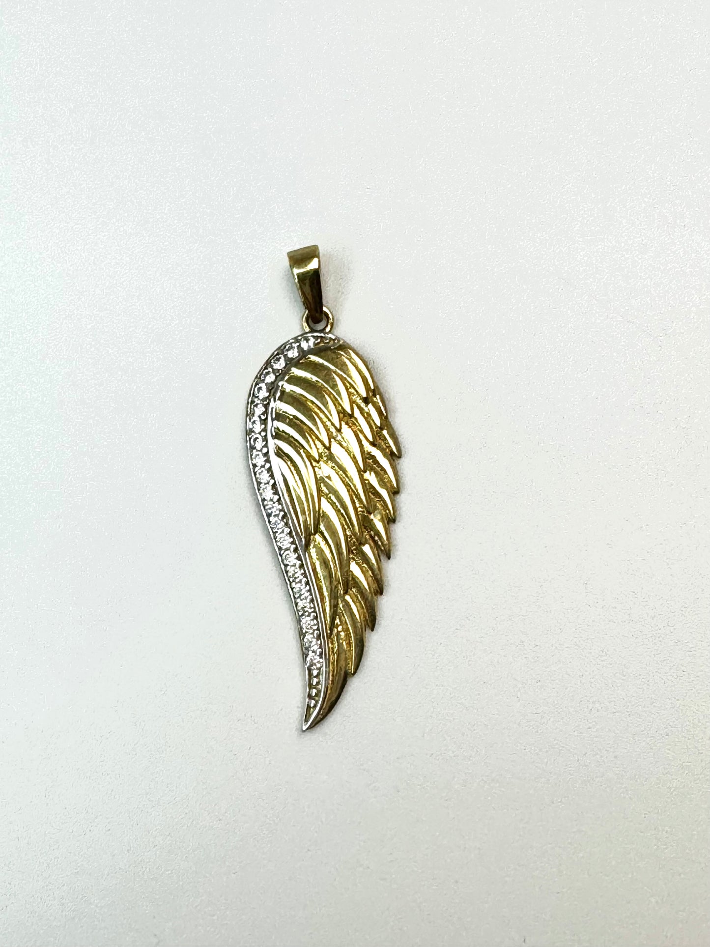 Gold wings pendant with zircon