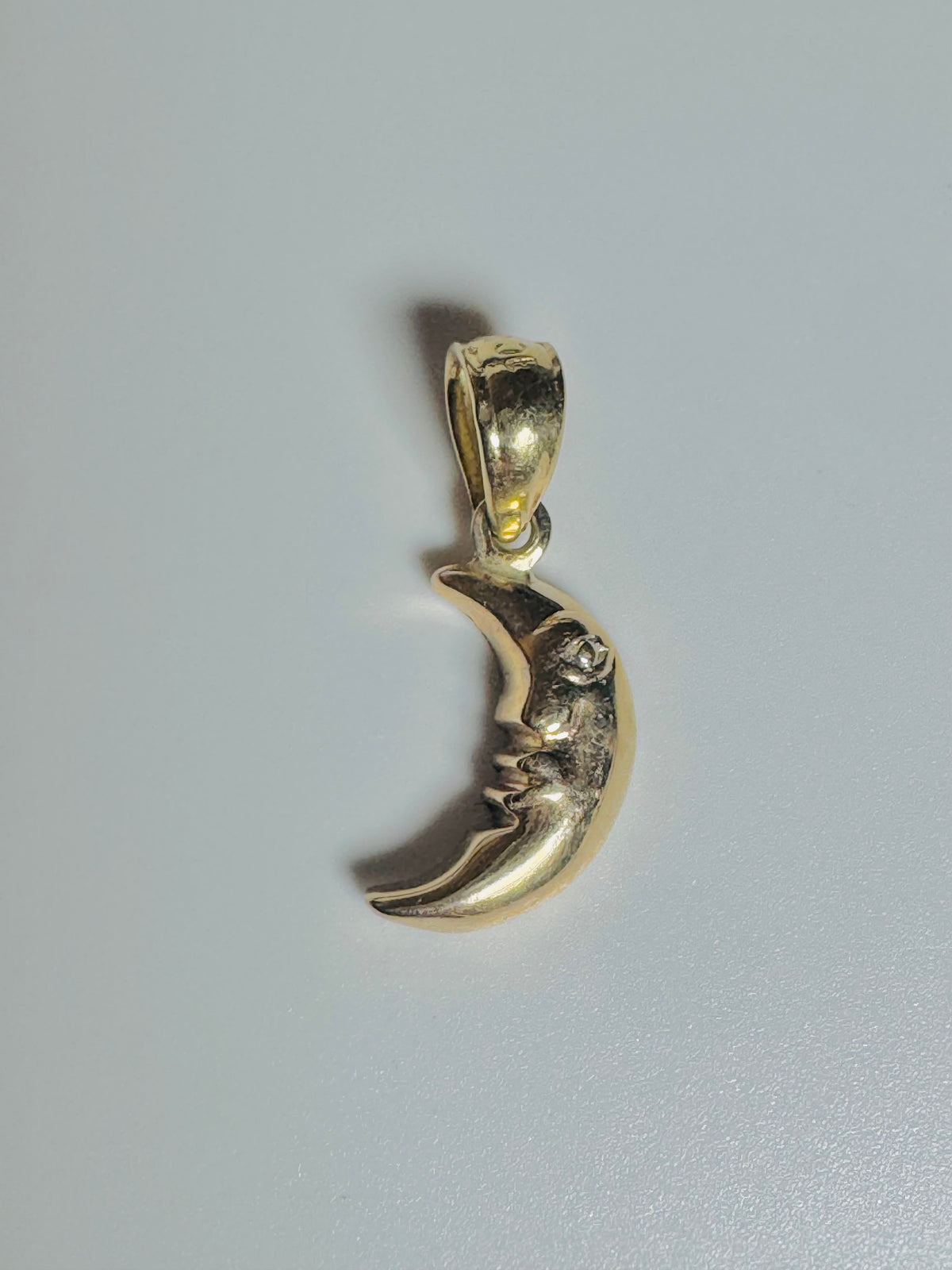#453 10k gold half-moon pendant