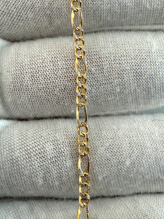 Chaîne figaro coupe diamantée 2,5mm en or 10k