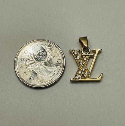 #442 pendentif LV avec zircon en or 10k
