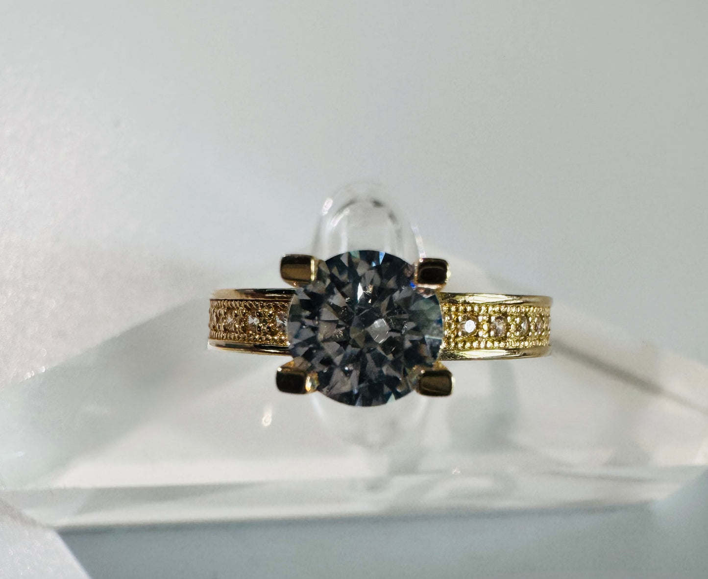 #203 bague alliance solitaire sertie de zircon en or 10k