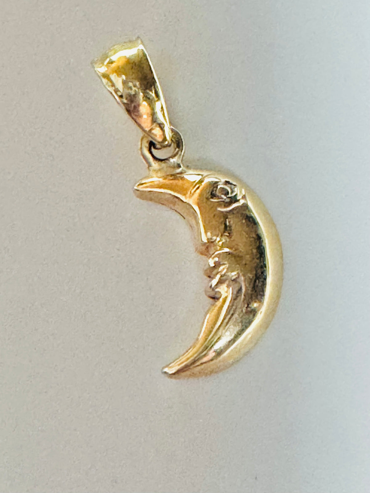 #453 10k gold half-moon pendant