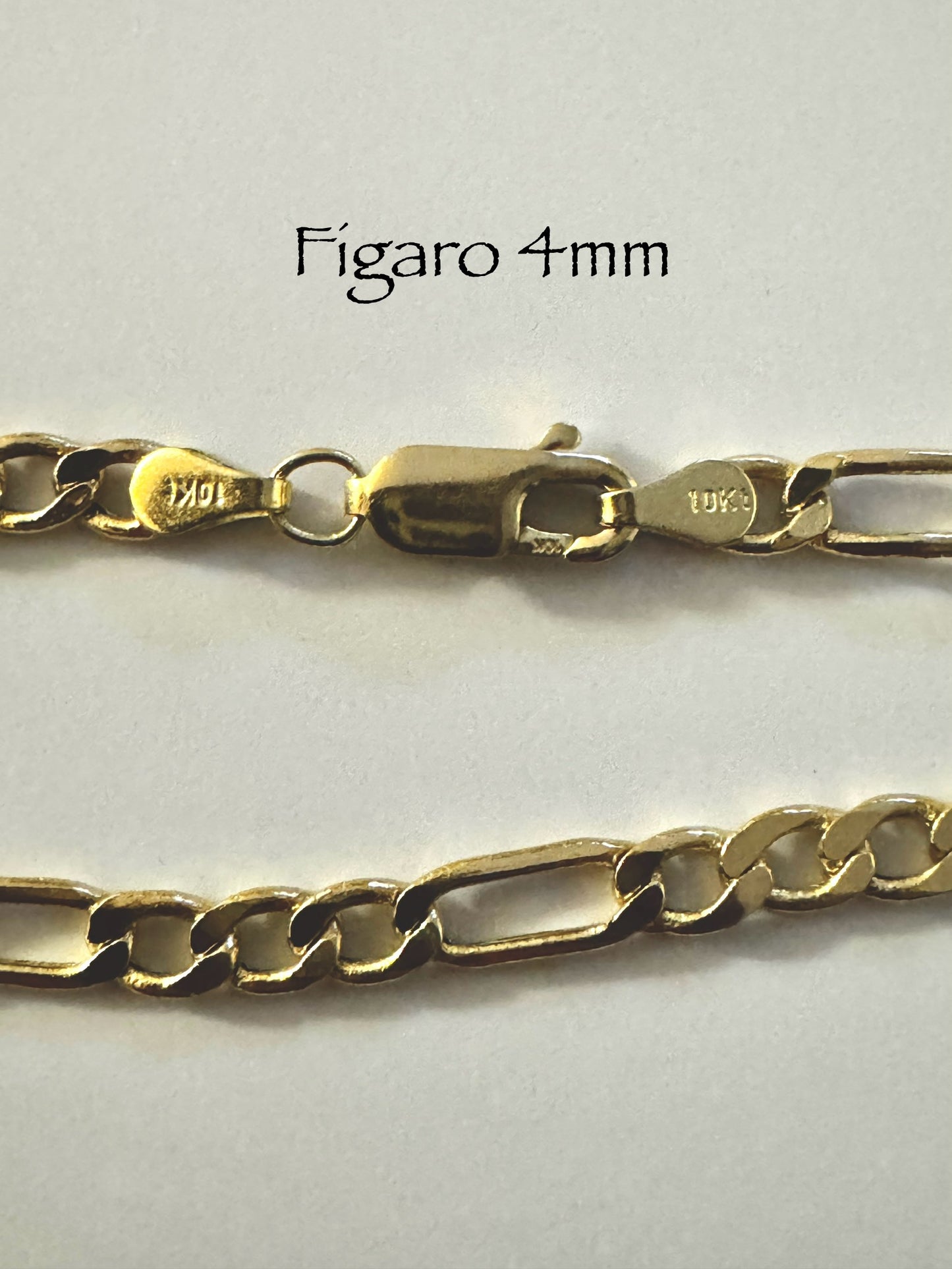 #106 bracelet figaro 4 mm en or 10k
