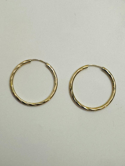 #318 boucles d’oreilles anneaux avec gravure fermoir intégré 1$ en or 10k