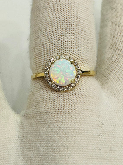 #215 Round ring with brilliant white stone and zircon in 10k gold