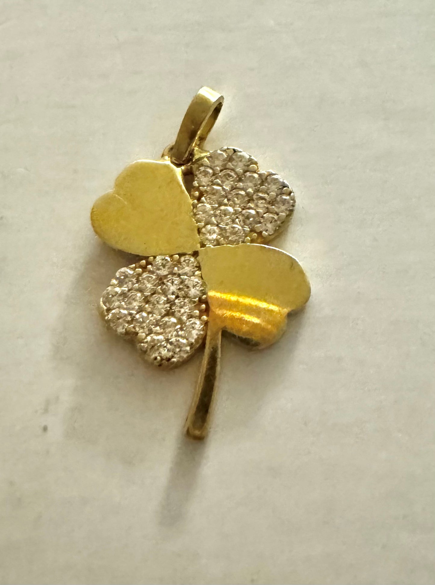 Gold clover pendant with zircon