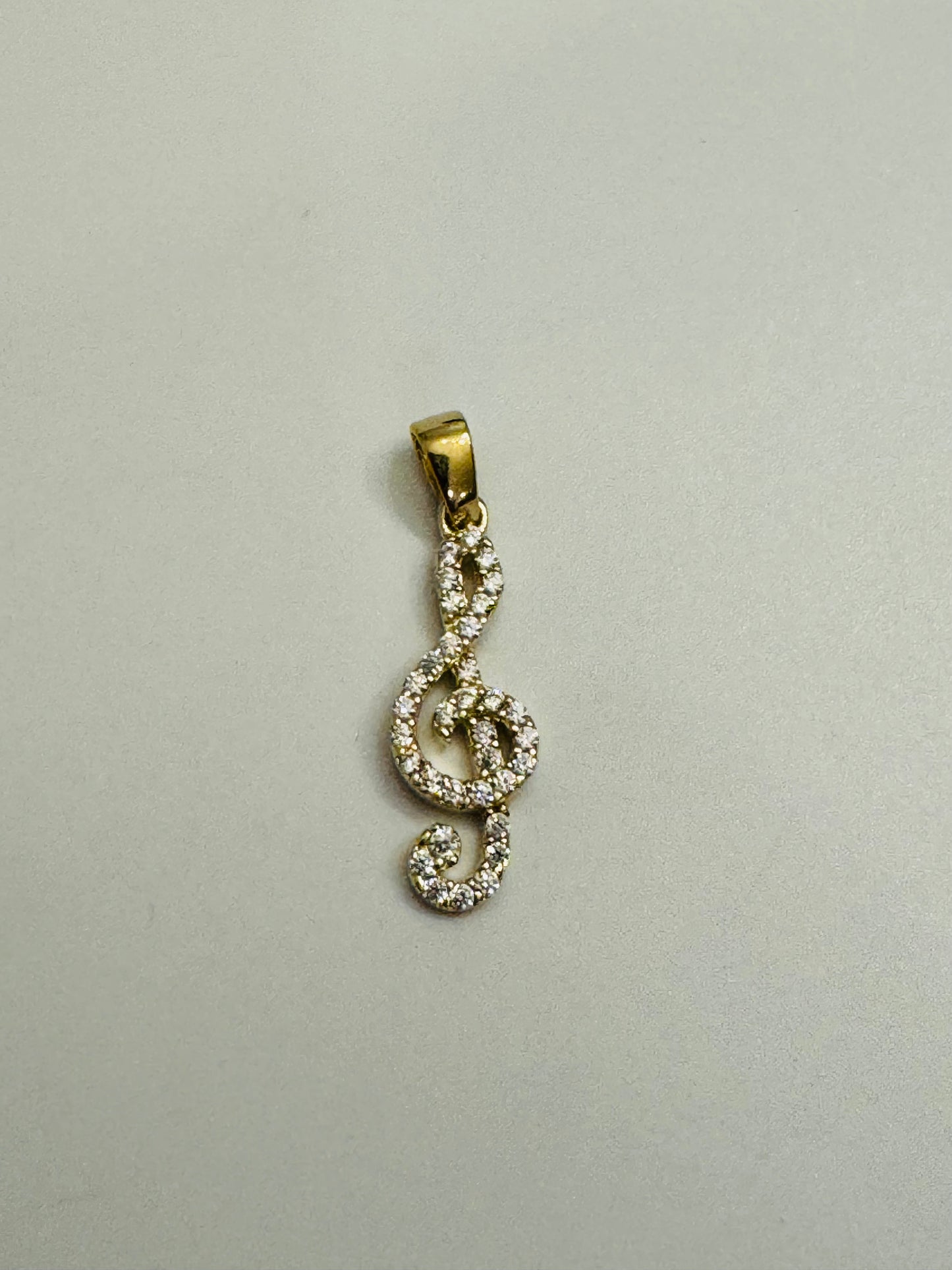 #462 pendentif note de musique clé de sol avec zircon en or 10k