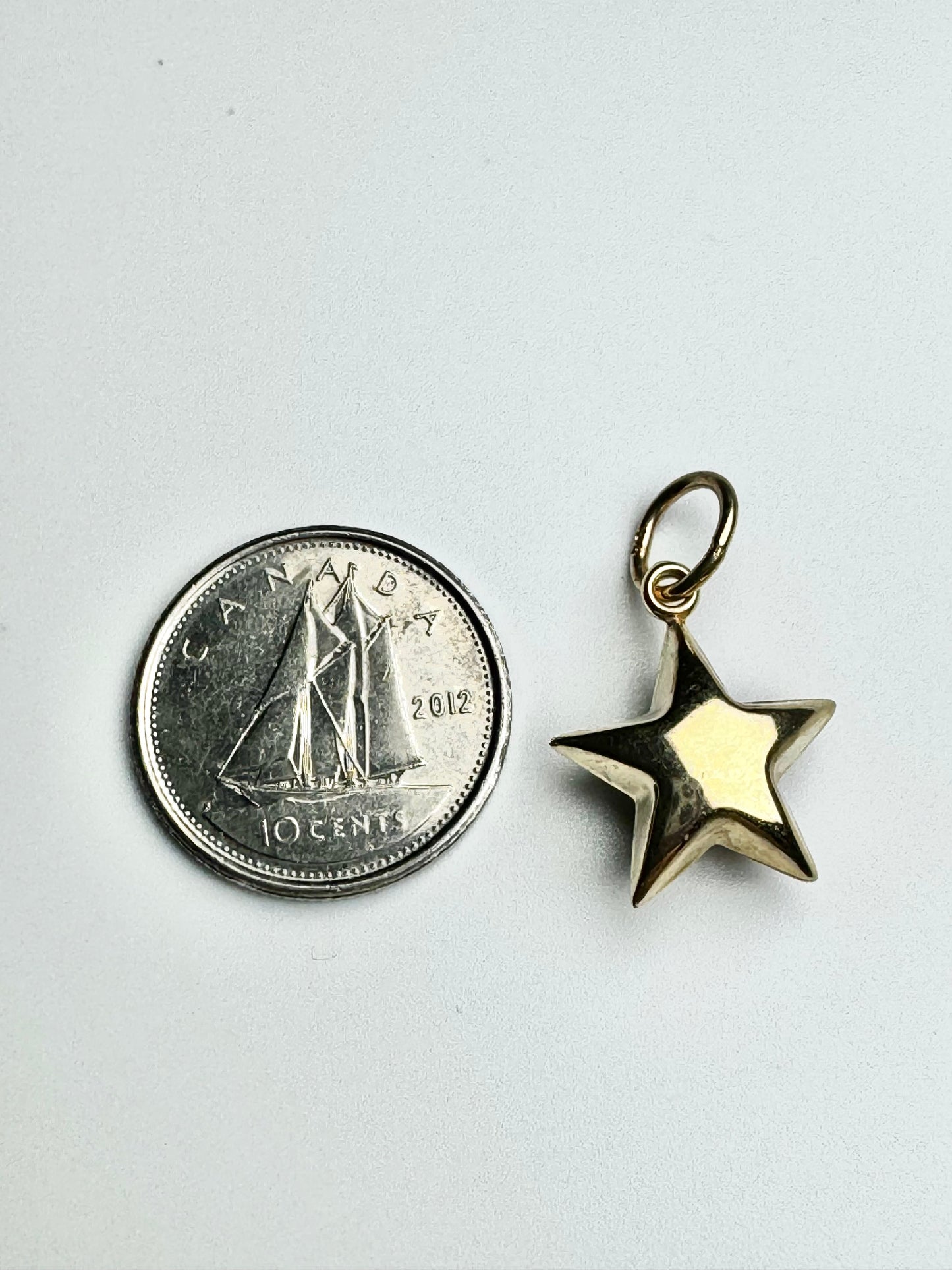 Gold domed star pendant