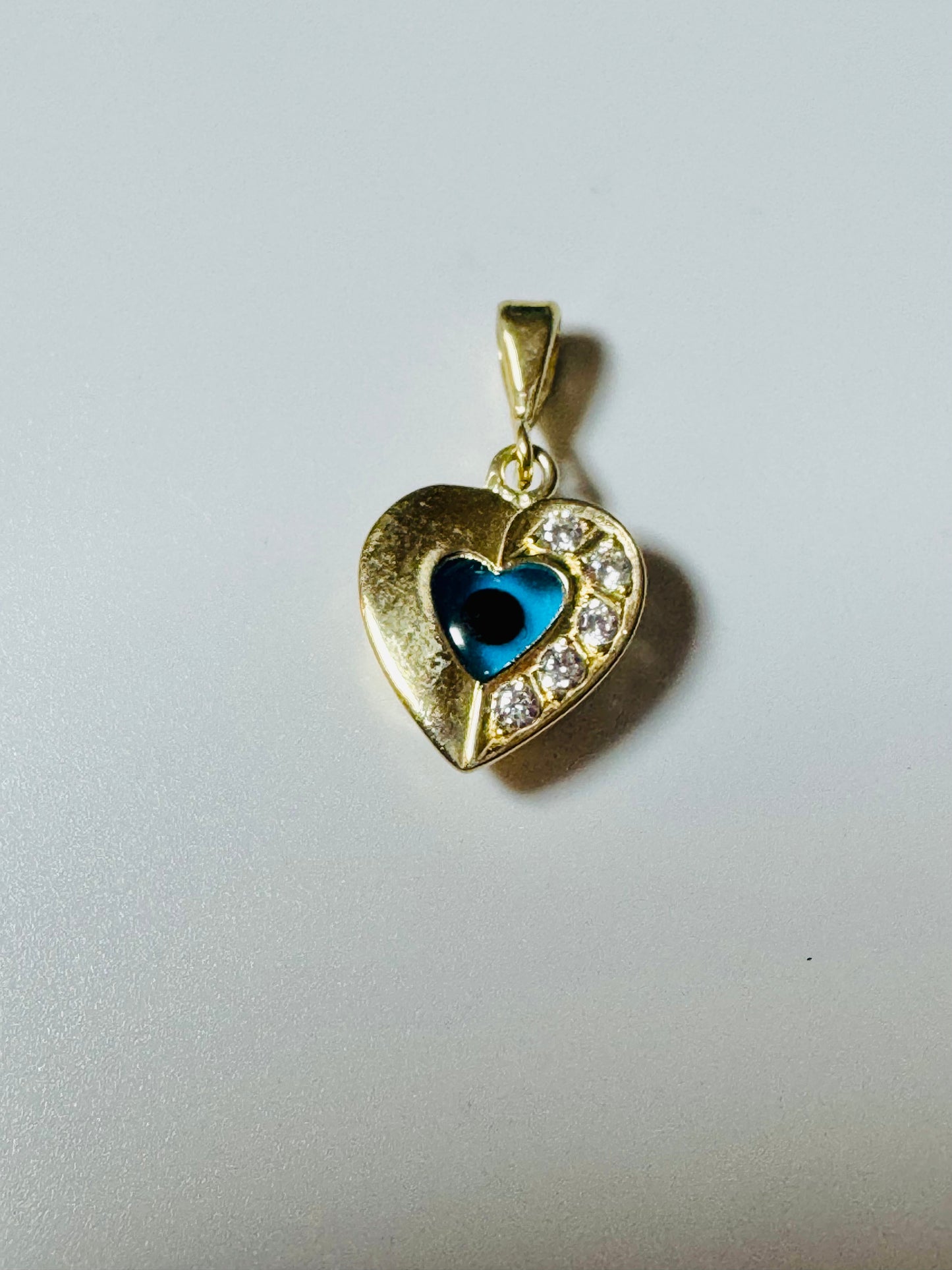 #468 Heart pendant with third eye and zircon in 10k gold