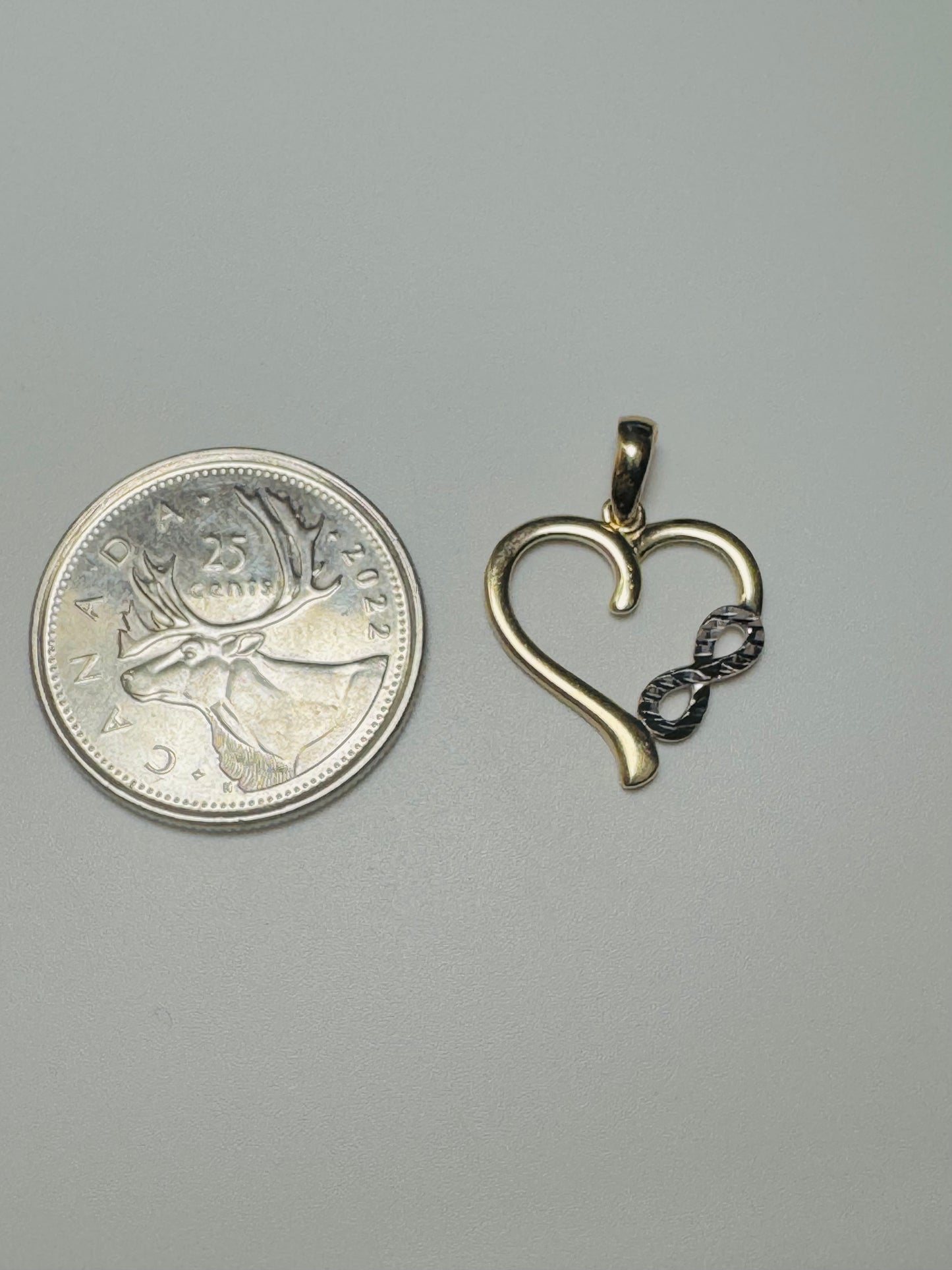 Pendentif cœur or jaune avec infini or blanc 10 carats