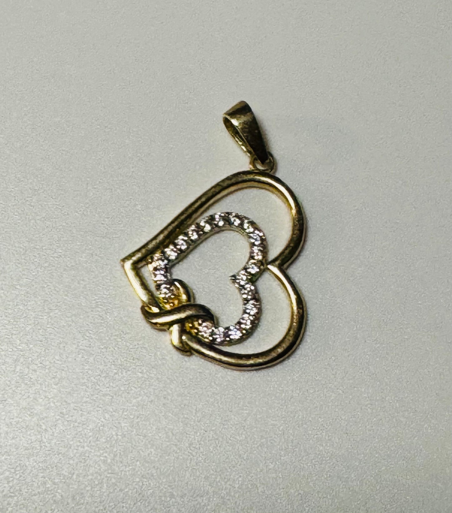 Pendentif cœur entrelacé avec zircon