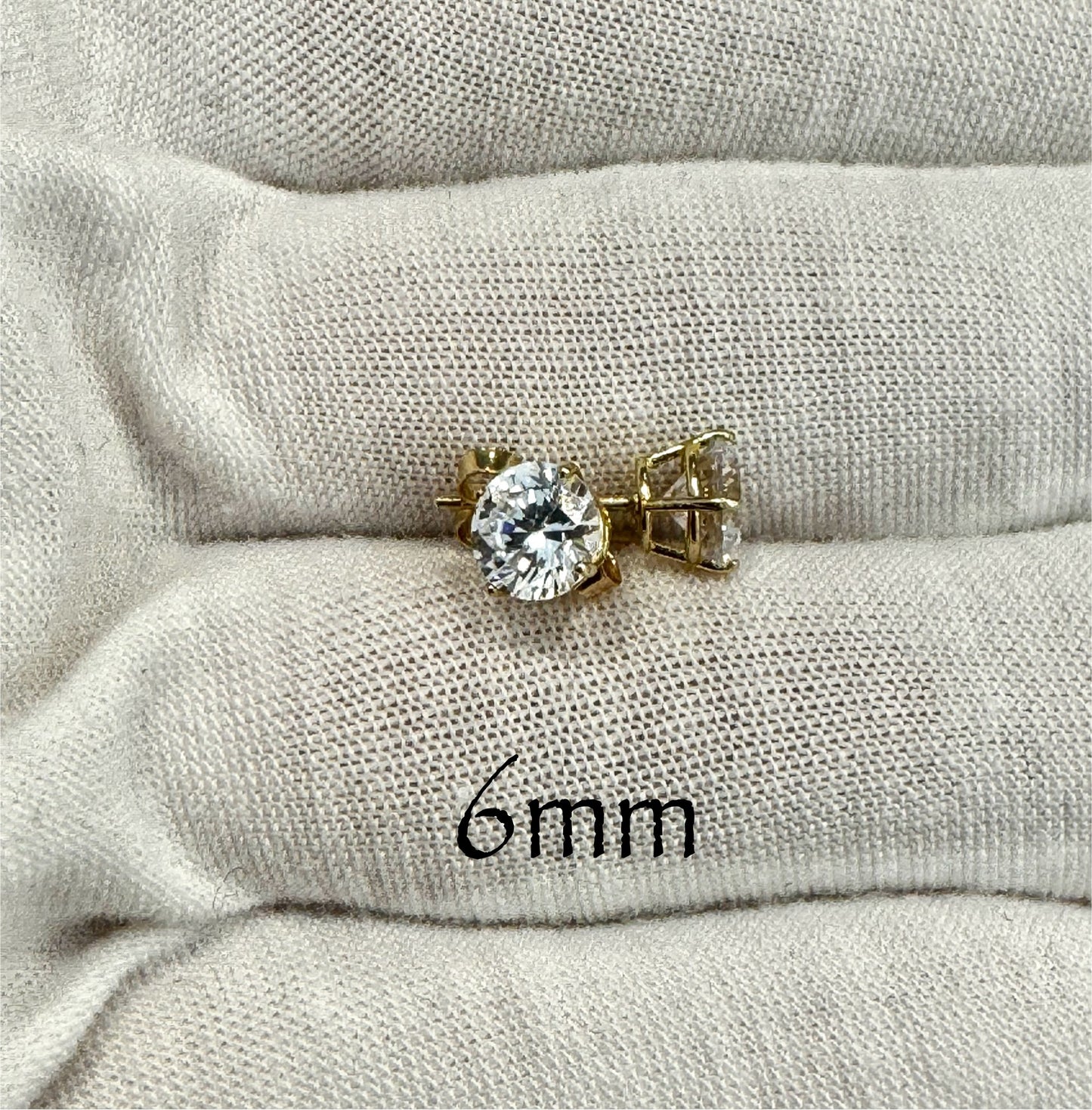 Stud earrings with round white zircon