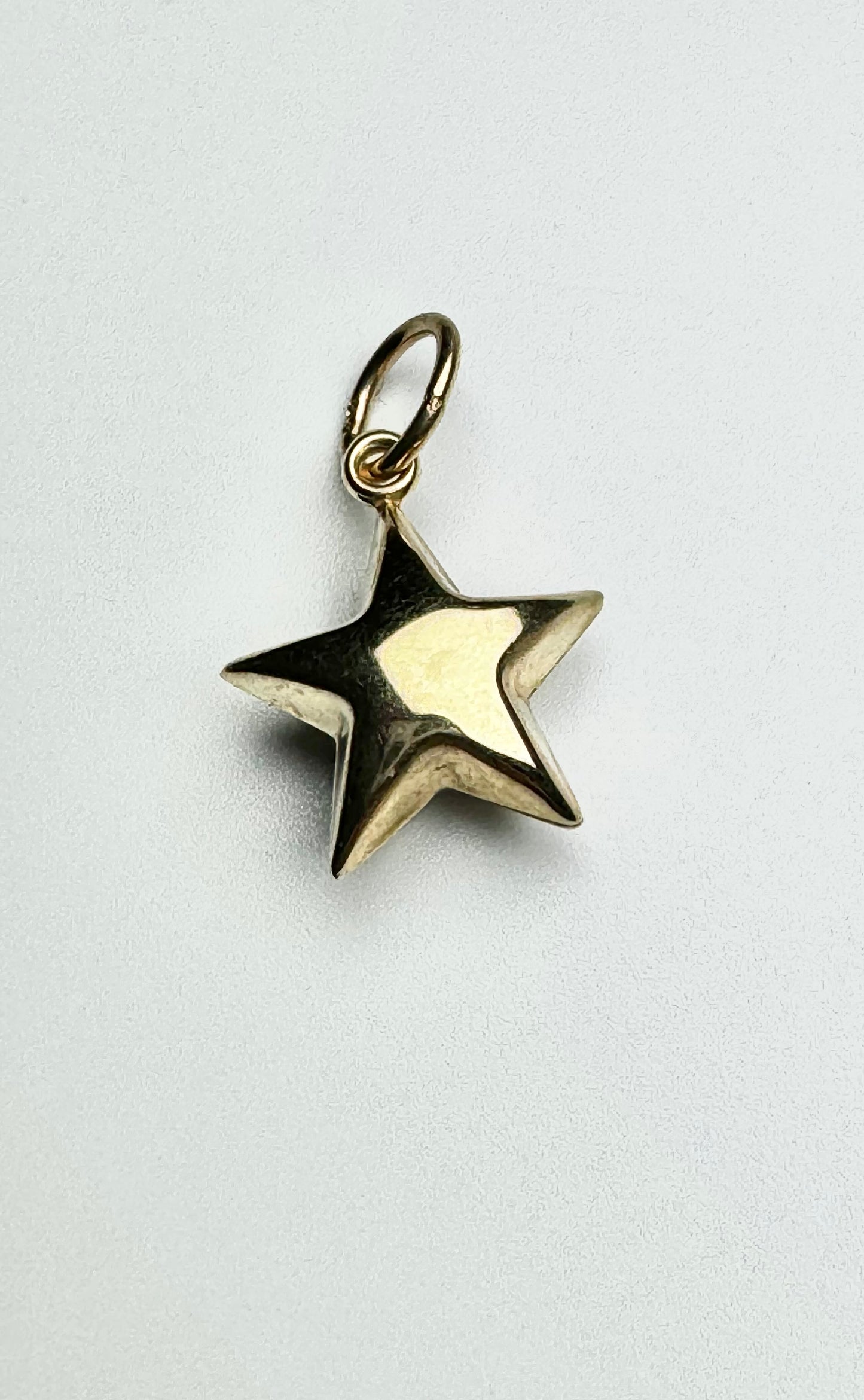 Gold domed star pendant