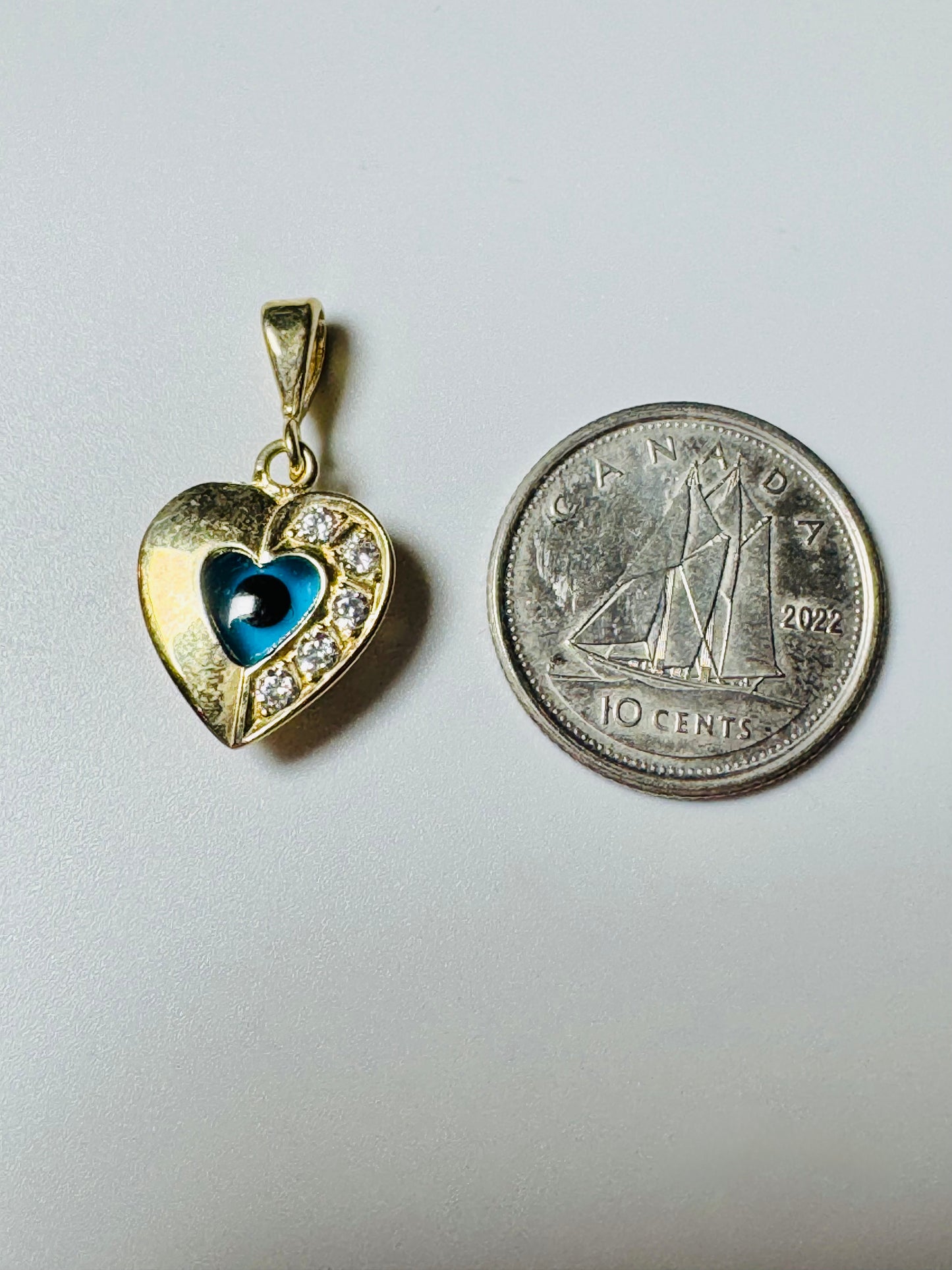 #468 Heart pendant with third eye and zircon in 10k gold