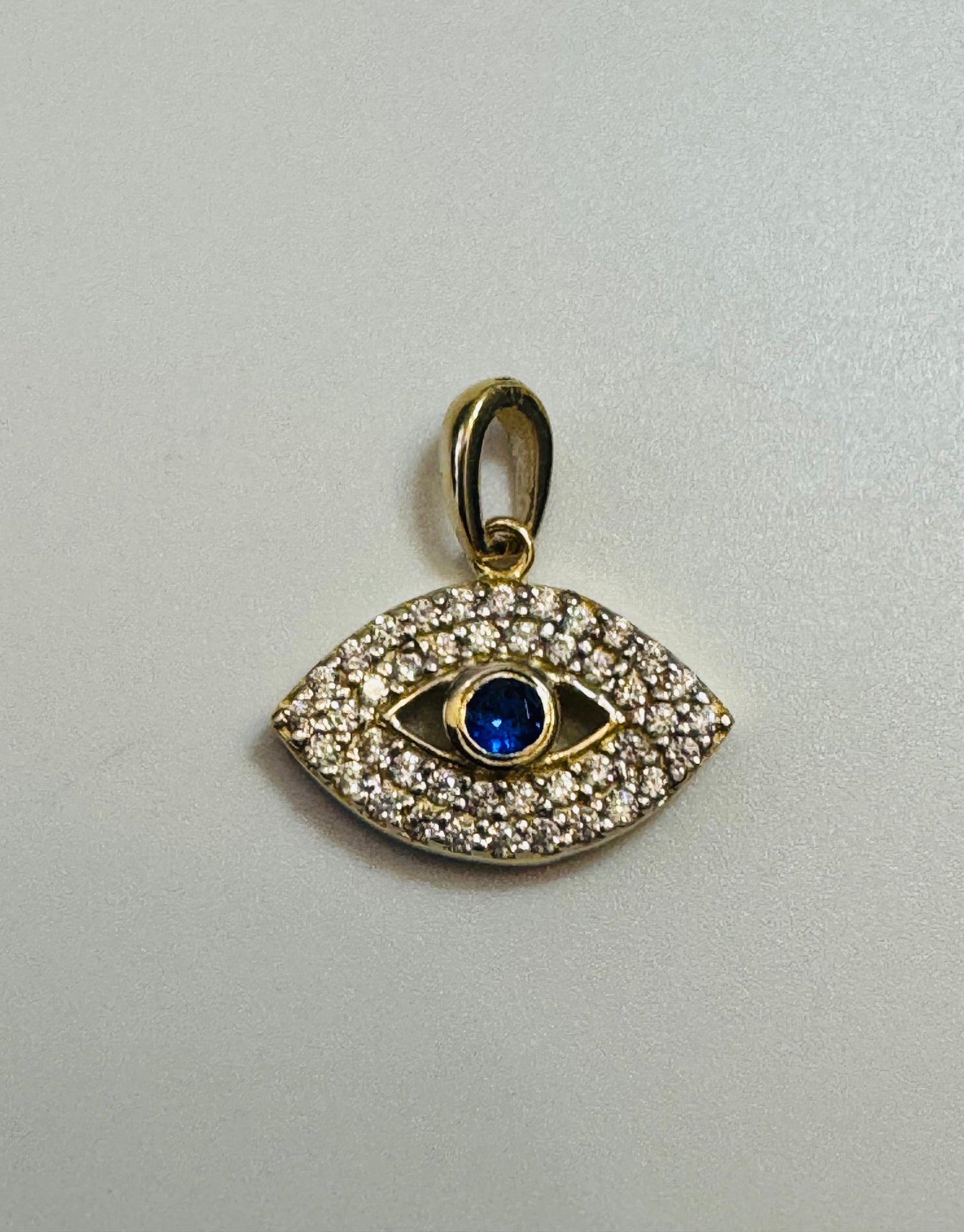 #444 Pendentif petit 3ème œil avec zircon blanc et bleu en or 10 carats